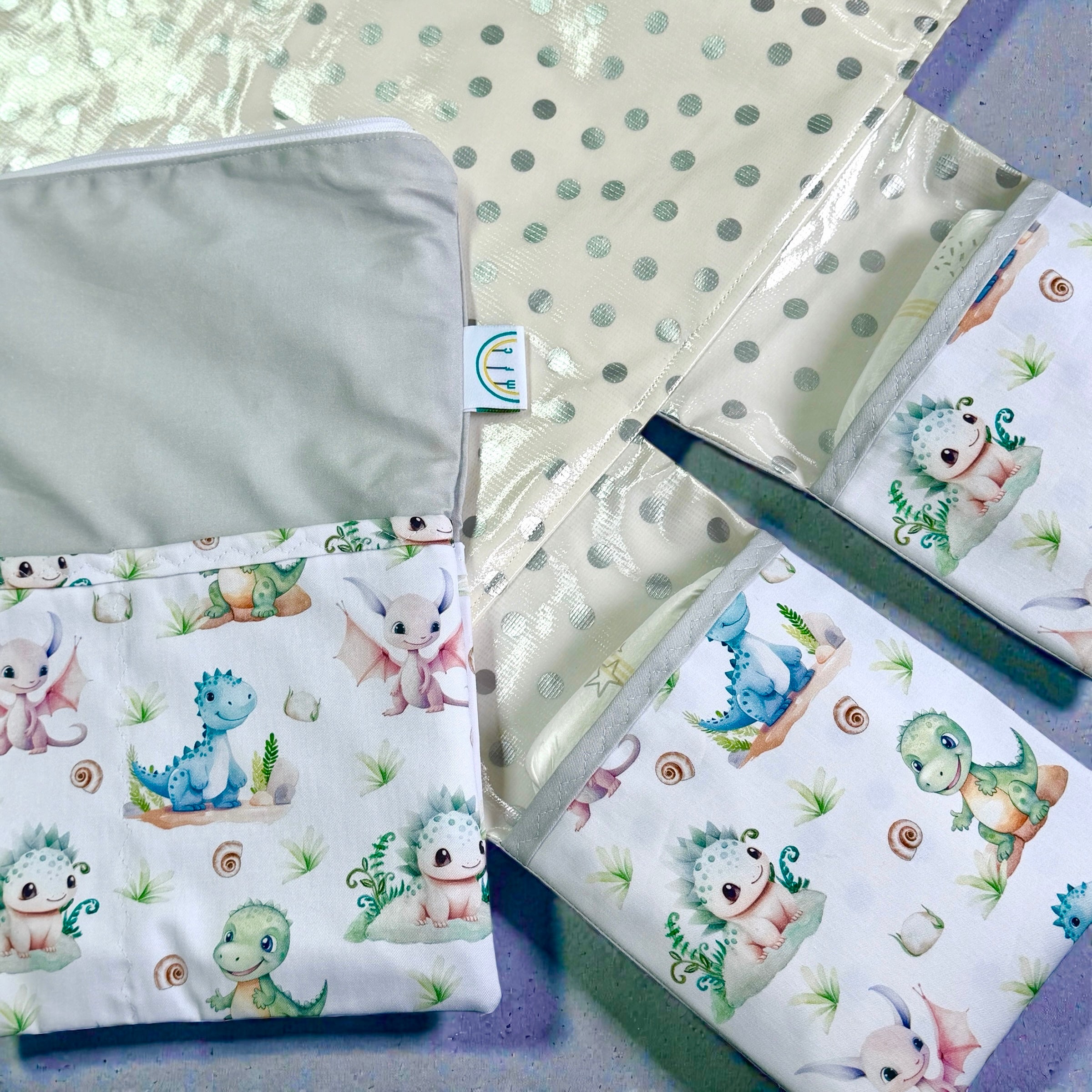 baby change nat with 2 pockets with cute dinosaur and dragon fabric multicoloured